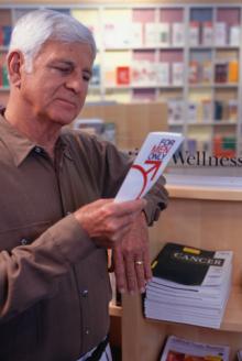 mature man looking at medical brochure, prostate.jpg